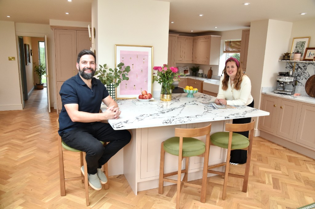 Homeowners in a completed Kitchen Room kitchen