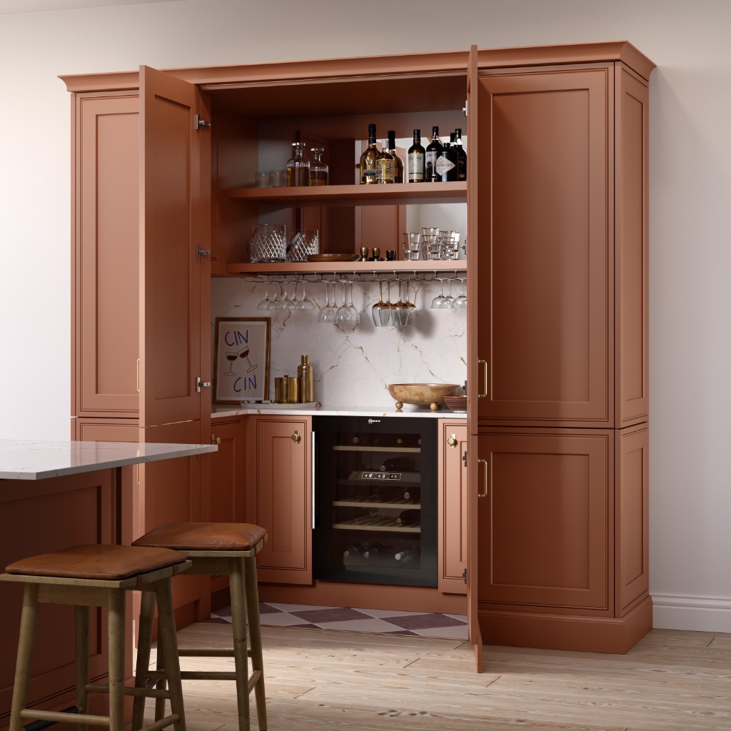 Terracotta in-frame cabinetry with marble and brass
