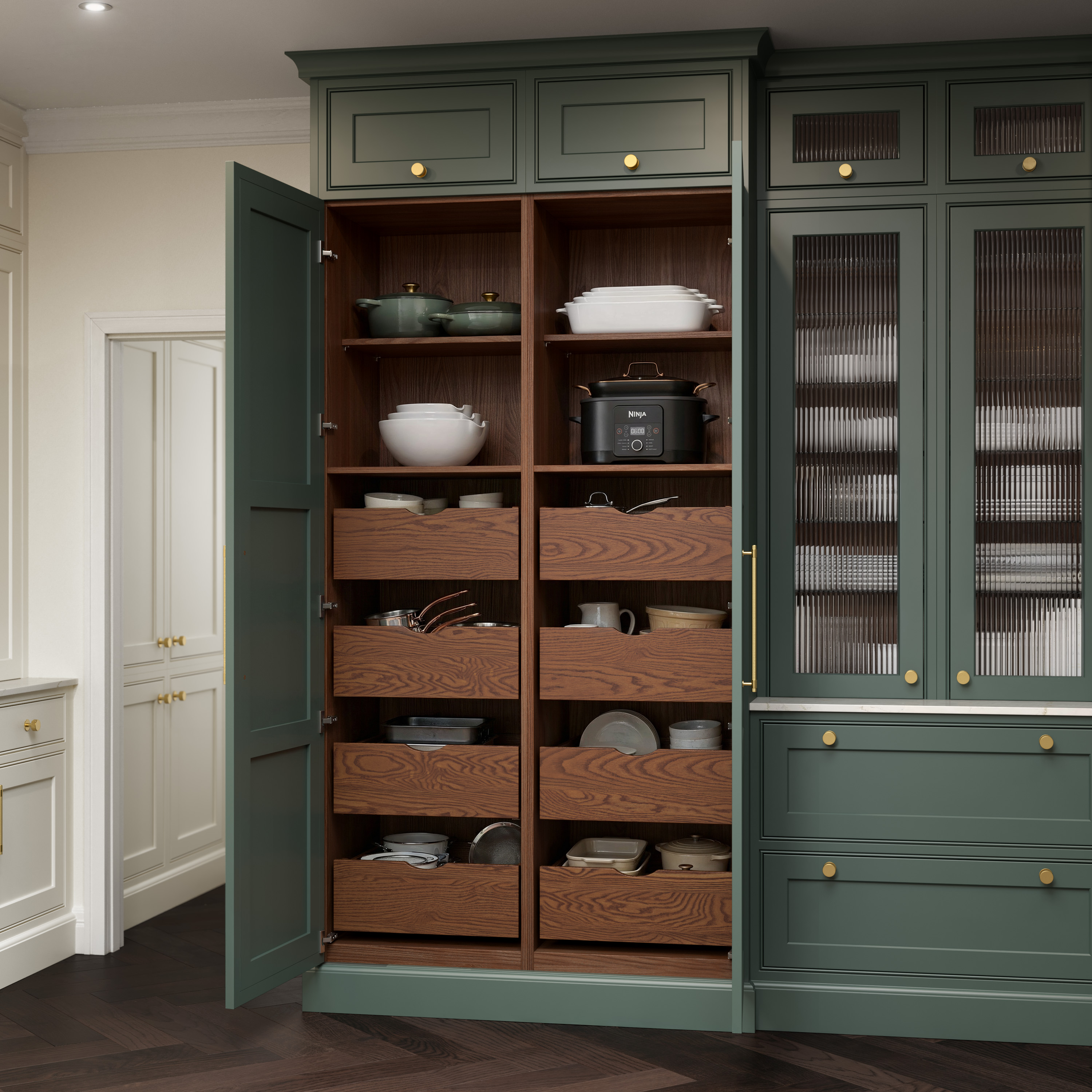 Emerald green in-frame larder cabinetry