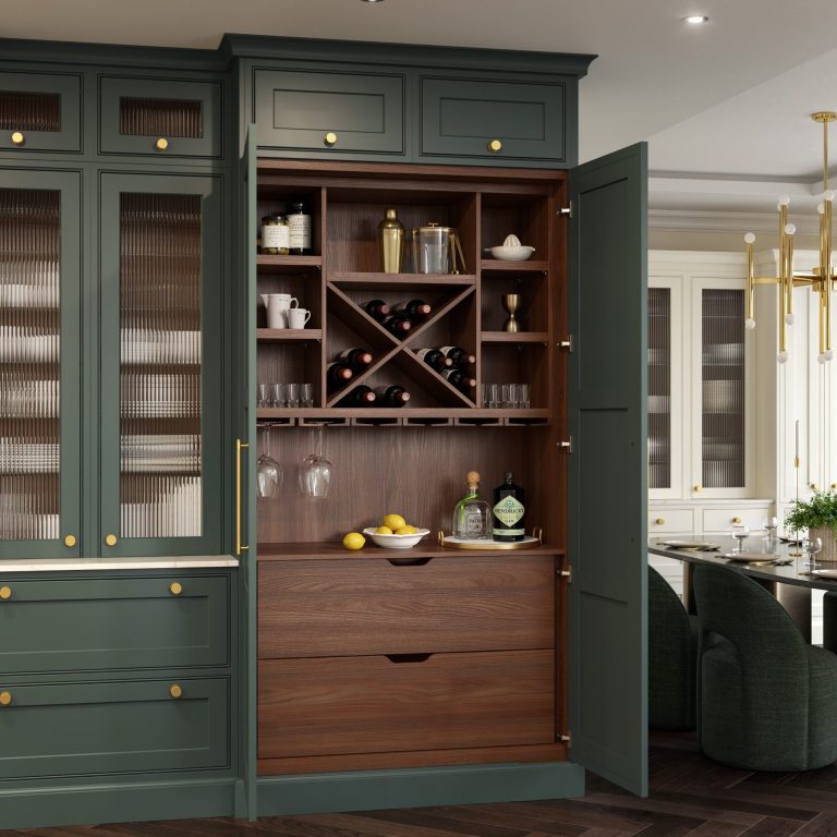 British-made kitchen cabinetry with a corner carousel storing pots, pans and a colander, showing craftsmanship and clever storage British-made kitchen cabinetry with a corner carousel storing pots, pans and a colander, showing craftsmanship and clever storage